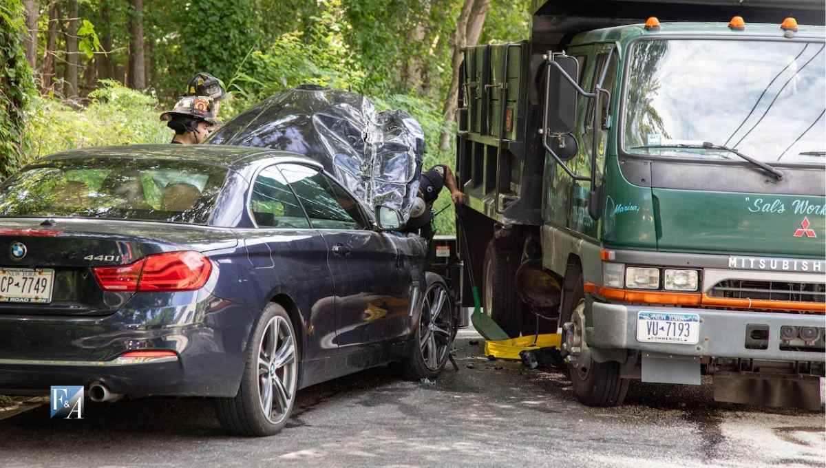 BMW and Landscaping Truck Collide